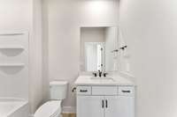 Private Bath in Guest Room 3.
Photo is of actual Home.