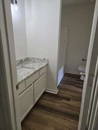 Hall Bath with double vanity and shower tub combo