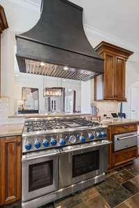 Cook and entertain in style with this spacious kitchen, seamlessly connecting to the living areas.