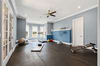 Ground-floor bedroom is perfectly suited for a multitude of uses.