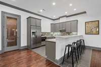 Basement-level living includes spacious full-sized kitchen.