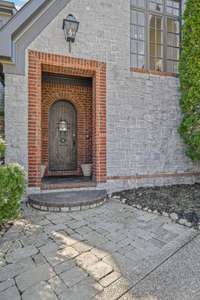 Timeless curb appeal with fresh updates and a picturesque setting that welcomes you home.