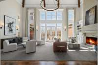 Flooded with natural light, this stunning space showcases floor-to-ceiling windows that frame breathtaking Williamson County views.