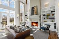 Flooded with natural light, this stunning space showcases floor-to-ceiling windows that frame breathtaking Williamson County views.