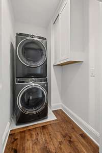 Second floor living space features the convenience of its own laundry room.
