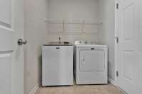 Separate Laundry Room has Tile Floor