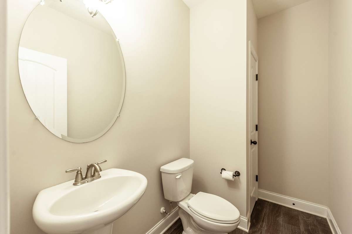 Half bath on first floor with storage closet