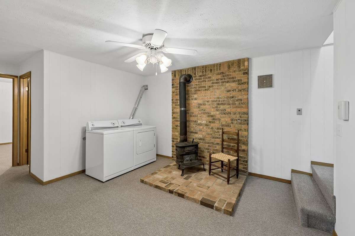 A large, convenient laundry room provides plenty of room to make quick work of laundry day.
