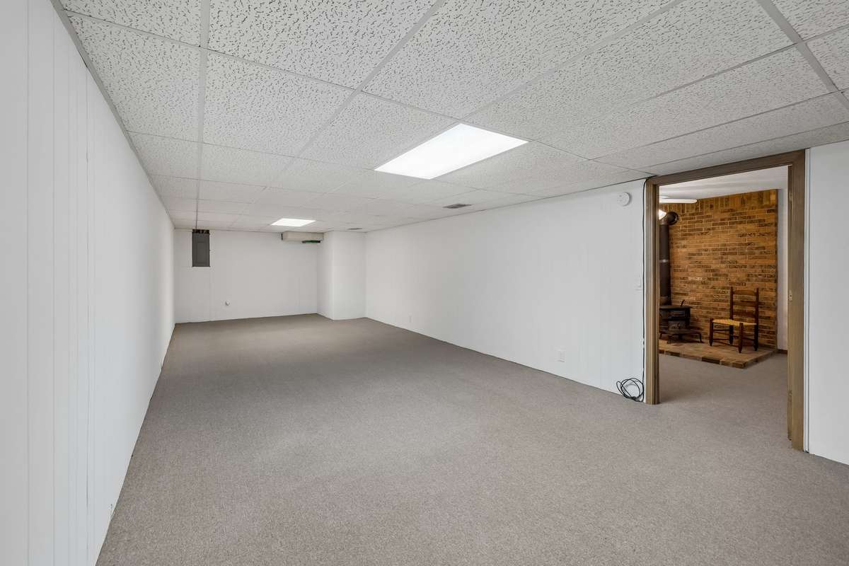 Conveniently and privately located between the laundry room and garage, the sky is the limit for this expansive bonus room.