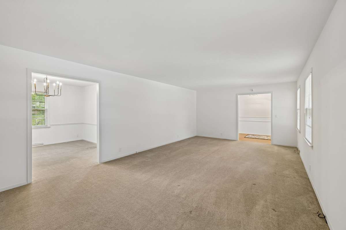This oversized living space provides either a peaceful retreat for relaxation or the perfect setting for hosting gatherings.