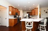 So much counter top space- BRAND NEW QUARTZ tops! And so many cabinets!