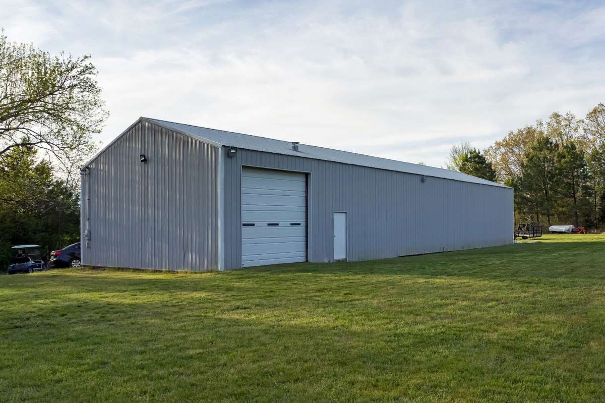 Big shop short distance from the main house and western town for all farm equipment and big office indoor space.
