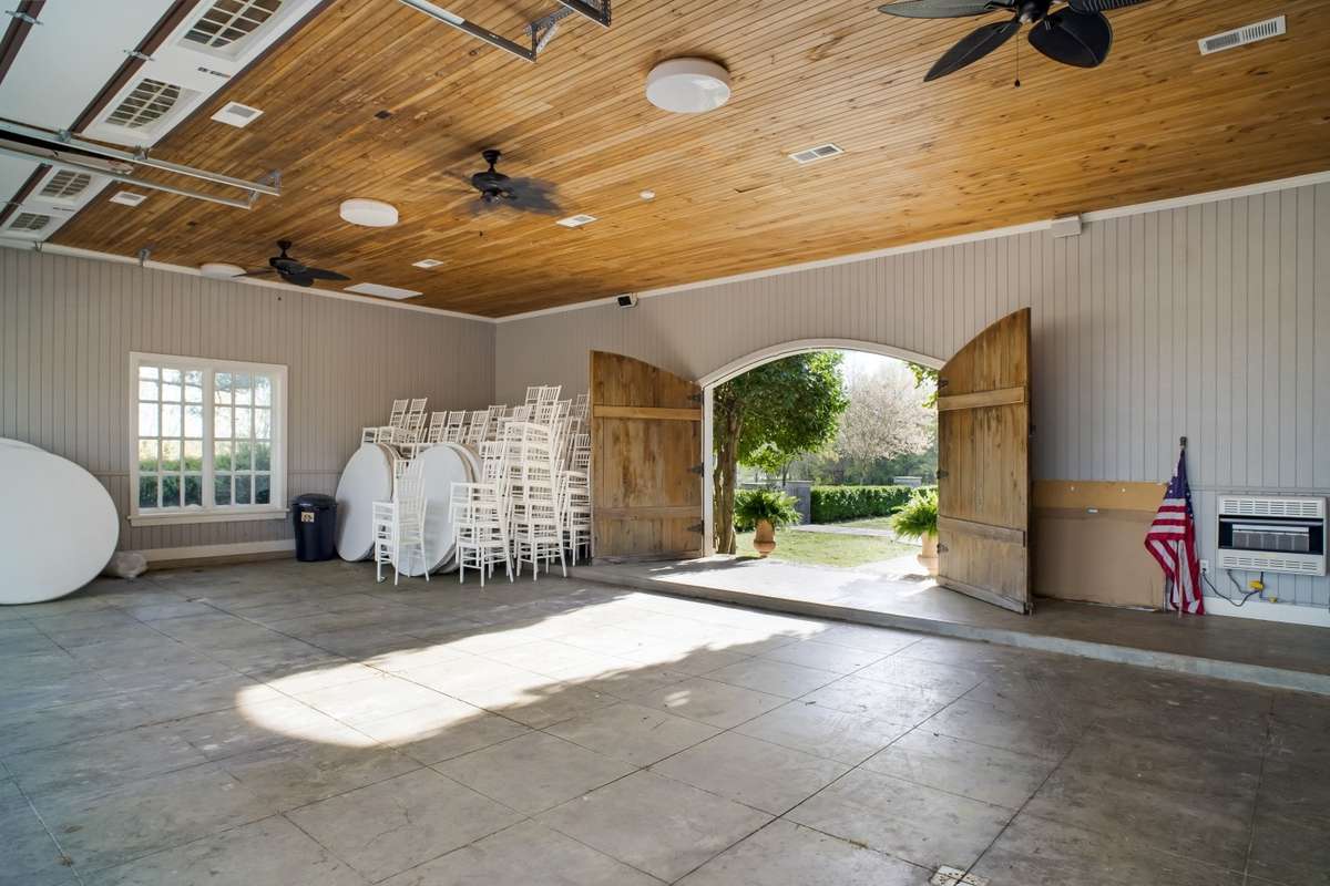 Climate Controlled Garage with tool area. There are also ATV's and farm equipment that can be purchased separately