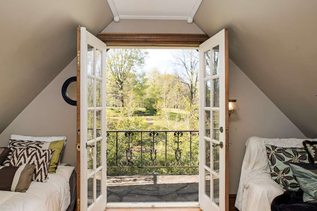2nd Primary Suite Flex space just off the bedroom for an extra kids sleeping area or meditation. In the spring there are beautiful flowers all around the balcony