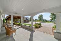 Relax in the shade of the rear covered patio and enjoy peaceful views of the courtyard.