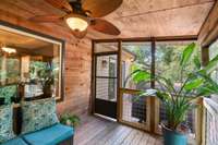 Screened in sunroom off the deck.