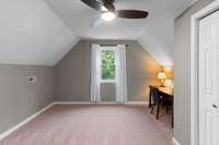 Bonus room that could also be used as a bedroom  as it has an extra large closet.