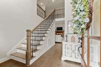 Welcome! As you enter this meticulously cared for home, the beautiful staircase catches your eye!