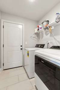 The laundry area is located off the garage entry.