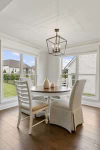 The breakfast nook is full of light with the windows and makes a great everyday dining space.