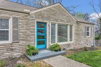 Newer windows, renovated kitchen, hardwood floors and a fireplace!