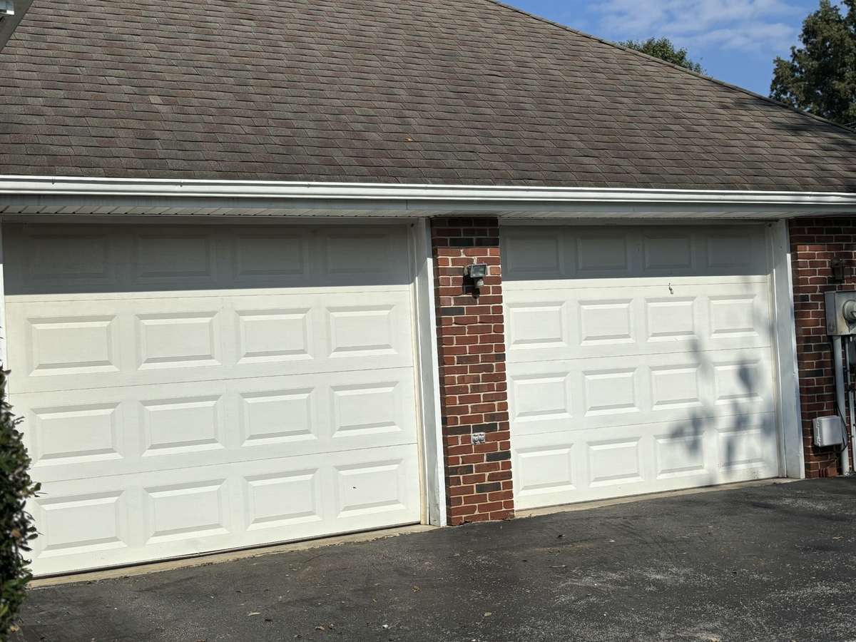 A 2 car attached garage protects your vehicles from weather.