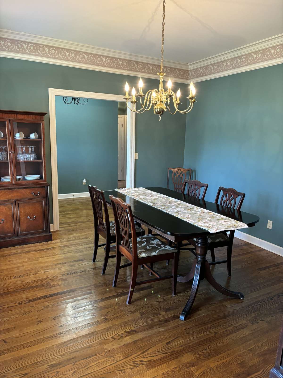 Here is another view of your living room showing access to the upstairs bonus/media/4th bedroom and 3rd bathroom.