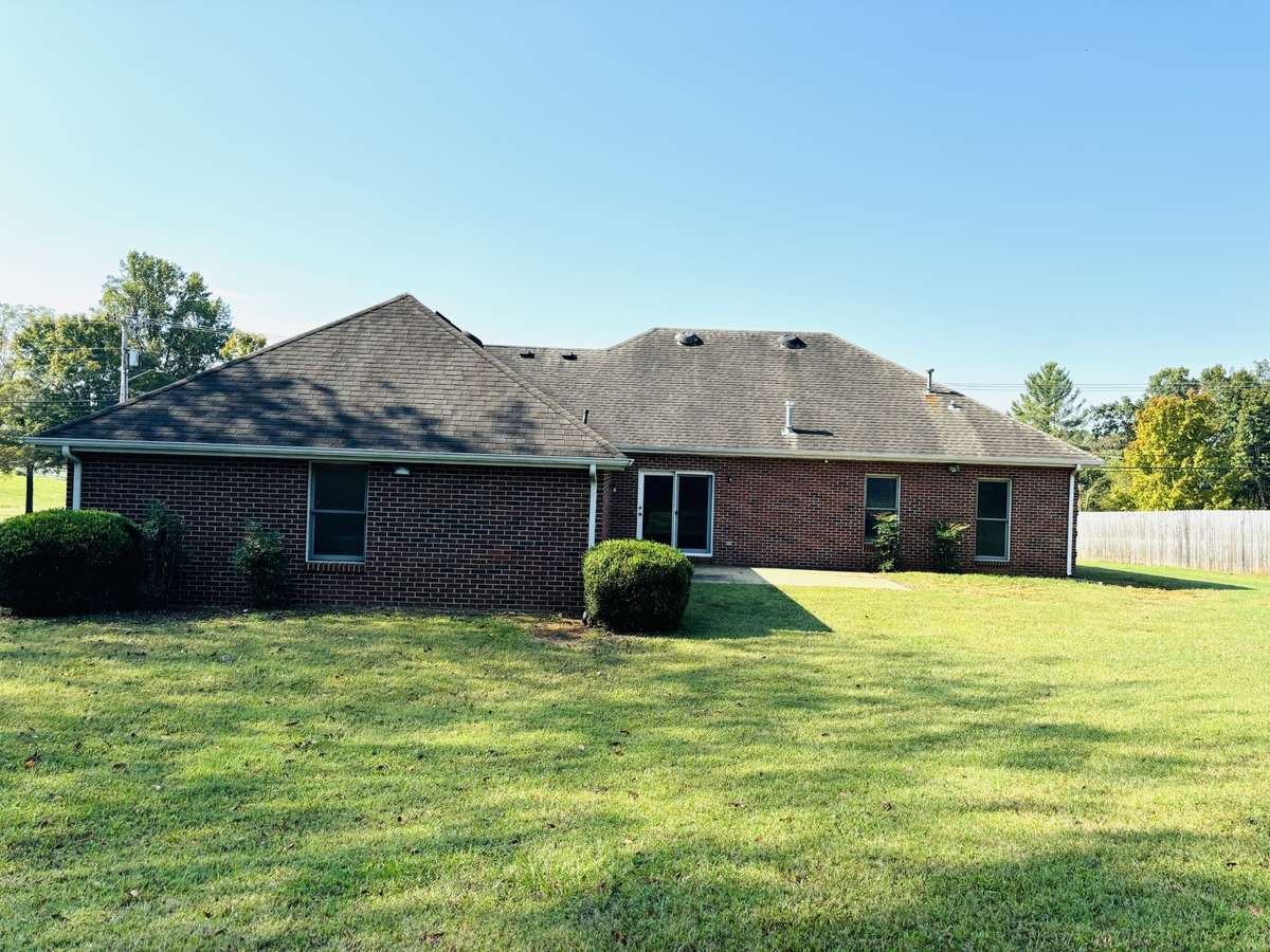 This picture shows the back of your home from the backyard.