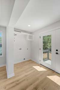 The laundry hook ups are located at the rear entry.