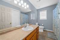 Full upstairs bath with lots of counter space and a linen closet