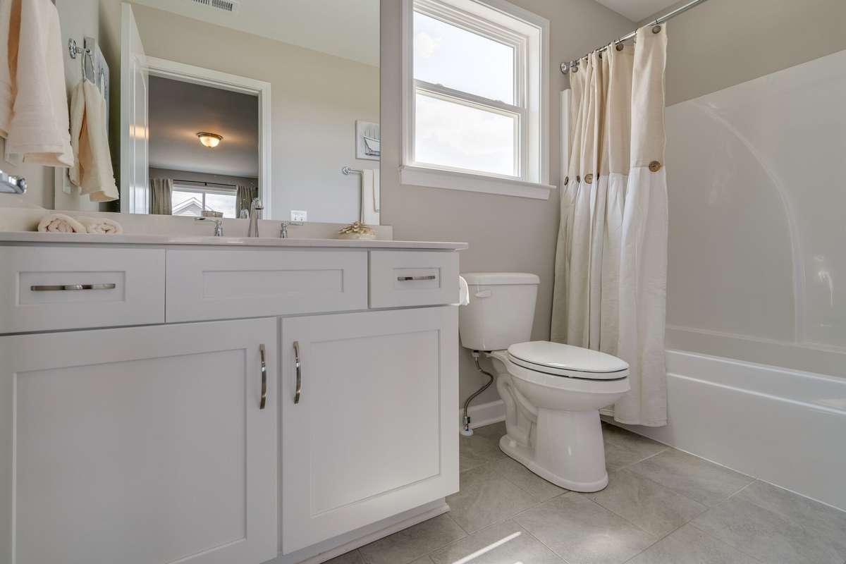 Full bathroom upstairs off of your bonus/additional bedroom
*previously built home, actual selections and finishes may vary