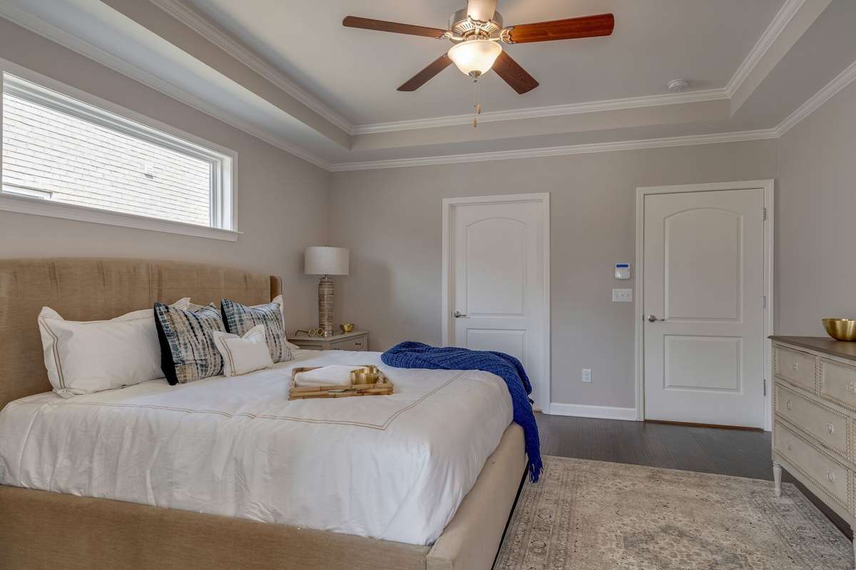 Primary Bedroom with tray ceiling
*previously built home, actual selections and finishes may vary