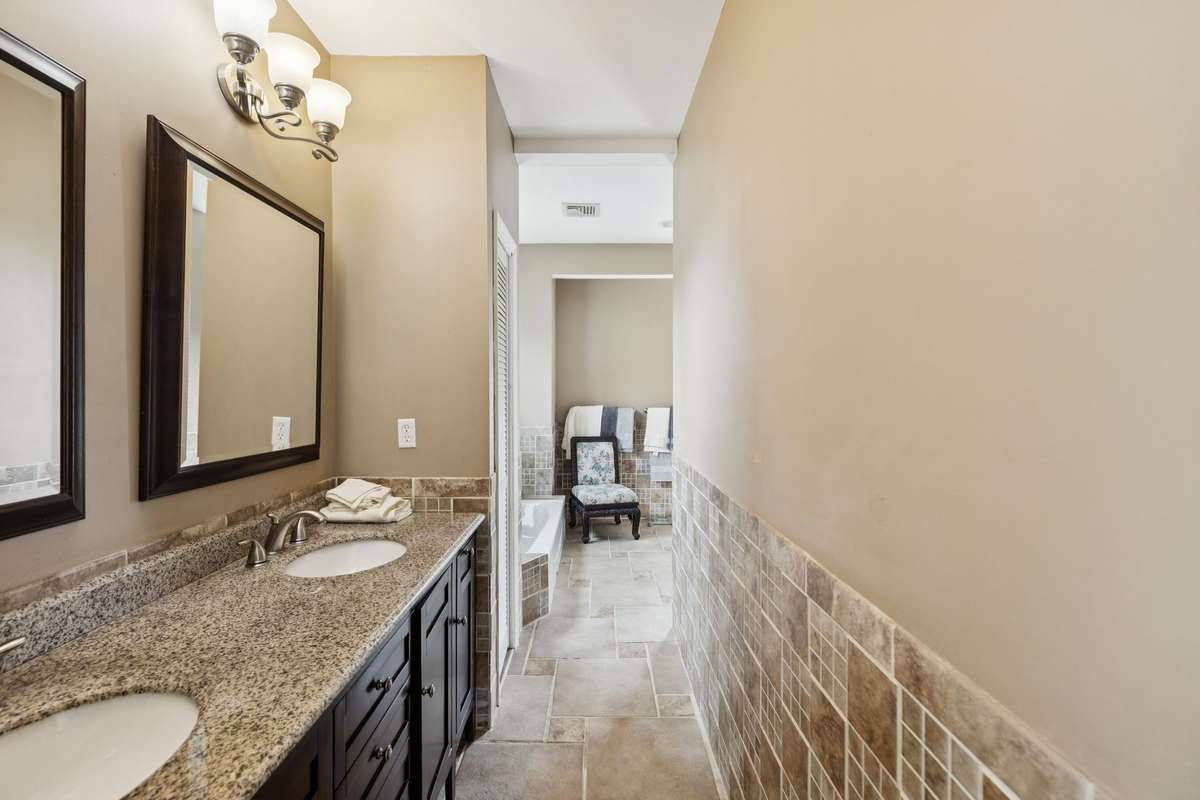 Large primary bath suite with double sinks