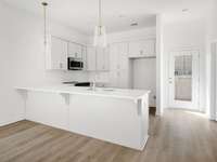 Photo is not of the actual home, but is an inspirational photo of builder’s model home and may depict options, furnishings, and/or decorator features that are not included