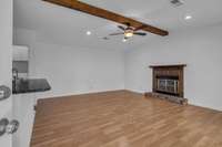 Wood-burning fireplace, ceiling fan with light kit