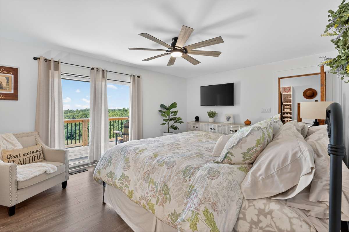 Walking into the primary bedroom does not disappoint! This primary bedroom features not only a stunning view but it has 2 separate closets, a luxury ensuite bathroom AND a separate private home office!