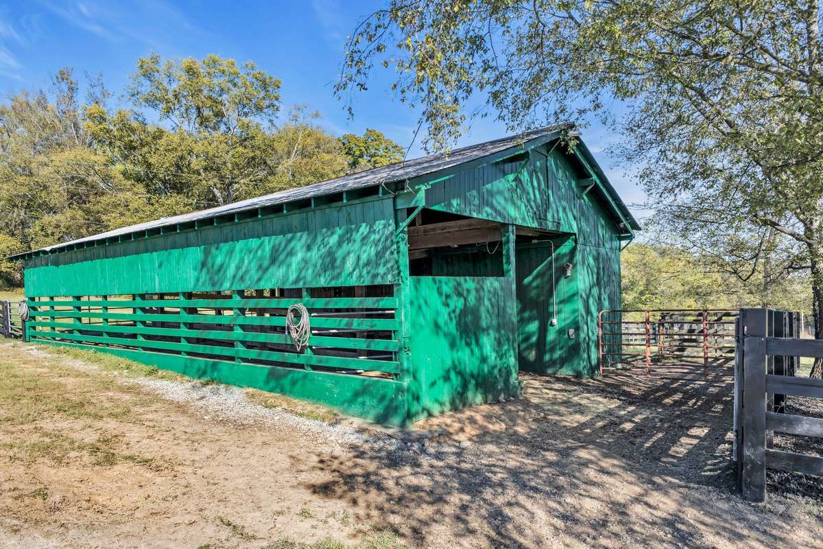 Currently used as an open barn for our cattle and horses. Can easily be converted to make stalls for horses if needed. This barn is also freshly painted and has dusk to dawn lights. Barn has electricity and water connection ( frost-free hydrant ).
