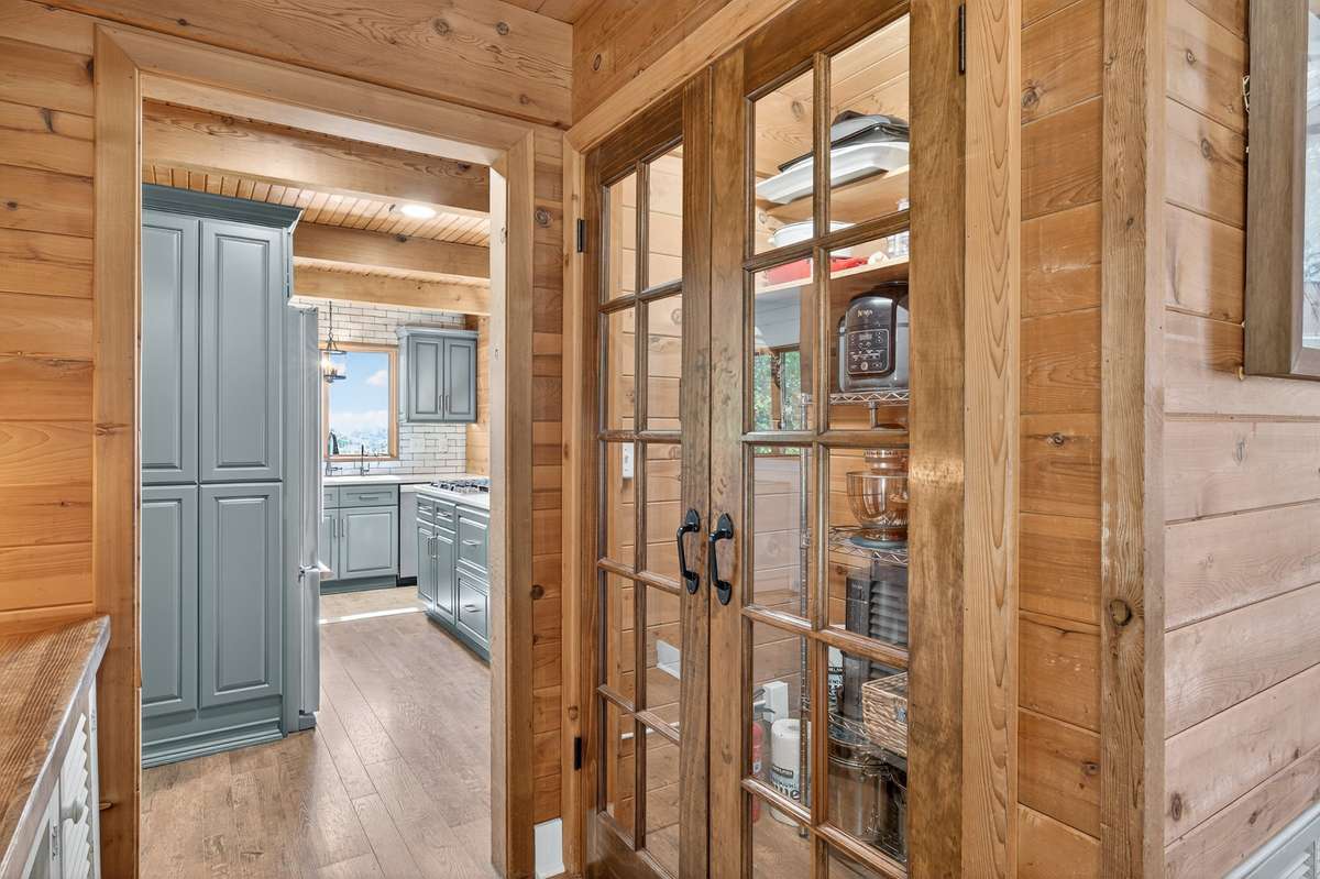 View from the front hallway towards the kitchen.