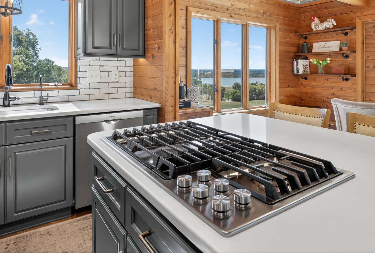 Large entertaining island is the hub of the home and is perfect for food prep!