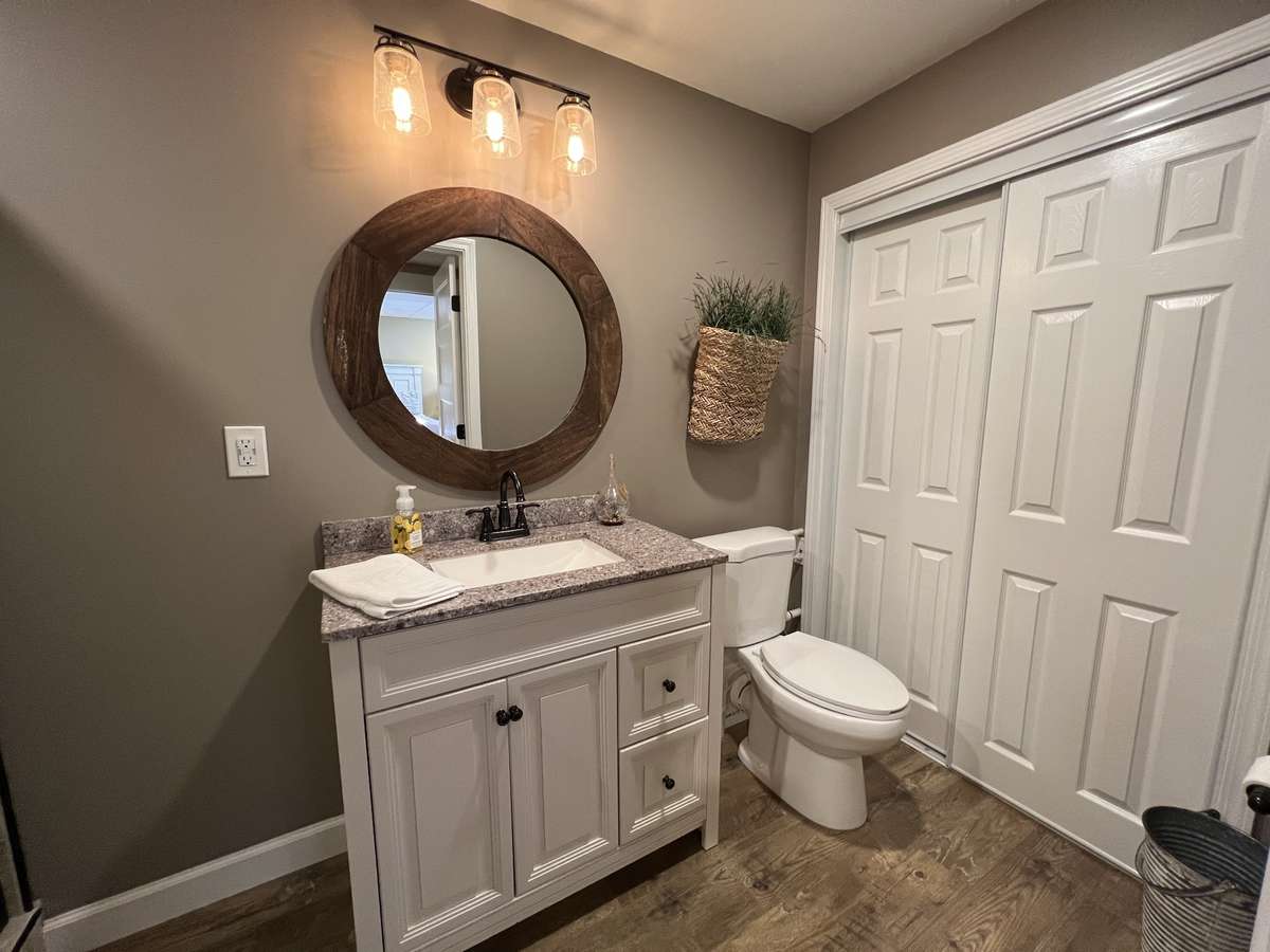 Basement also has a full bathroom. This is not your typical dark dingy basement. Your guests will never want to leave!
