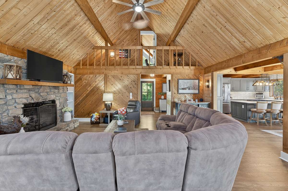View of the family room looking back at the loft railing.