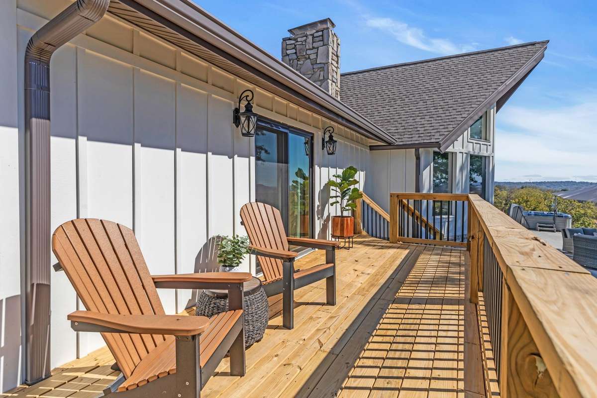 New private deck from the primary bedroom has access to patio and outside entrance to 2 car garage.