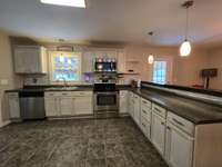 Very spacious kitchen with stainless steel appliances