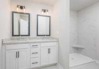 Primary En-Suite Bathroom with Tile Shower and Tile Floors!
