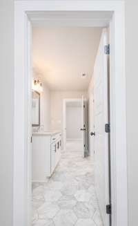 Jack & Jill Bathroom connects both of the Secondary Bedrooms!