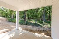 The Covered Back Patio is the perfect place for a peaceful morning cup of coffee