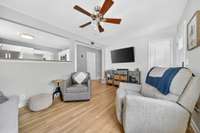 Open Floor plan with kitchen and coat closet by front door.