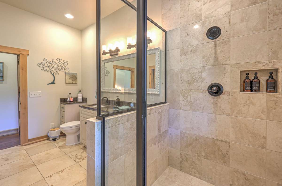Shower and flooring is travertine