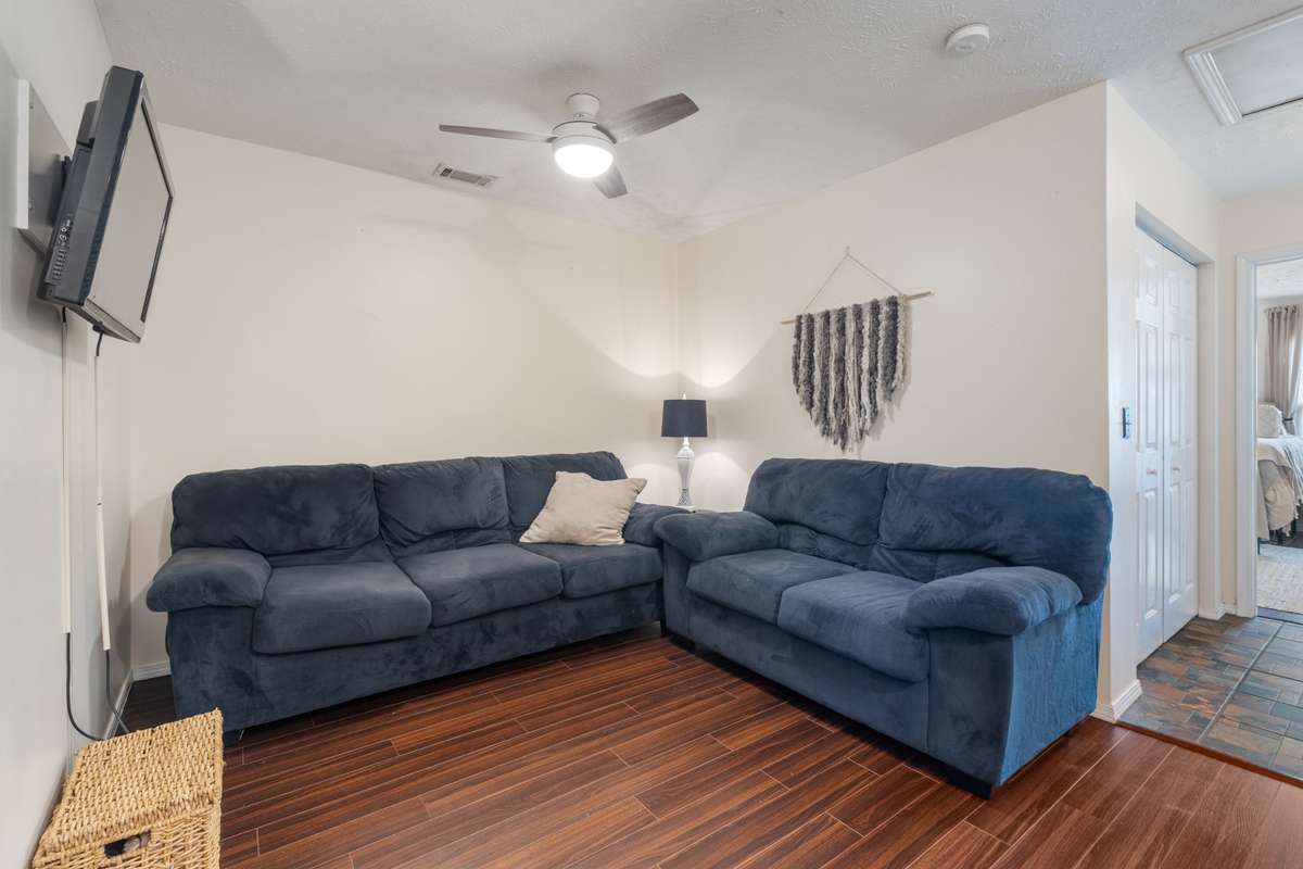 Upstairs, you will find a flex space complete with a ceiling fan and fresh paint.