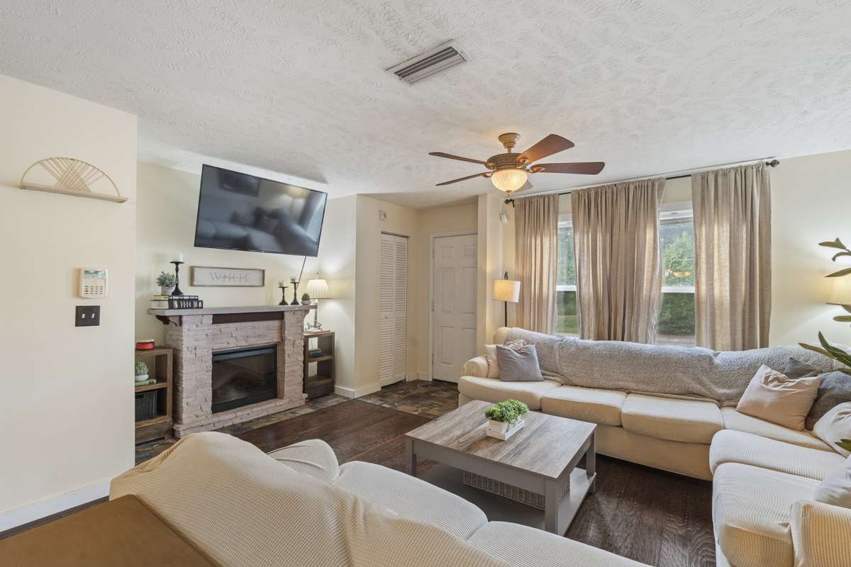 A lovely fireplace will keep you warm and offers an inviting aesthetic throughout the year.